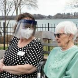 Emily with resident picture